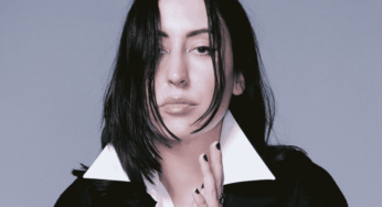 Elohim presents her uncanny exploration of isolation and cryptic connection in music video for new single “Tiny Human”